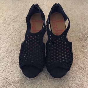 Black with cork like bottom platform wedges.